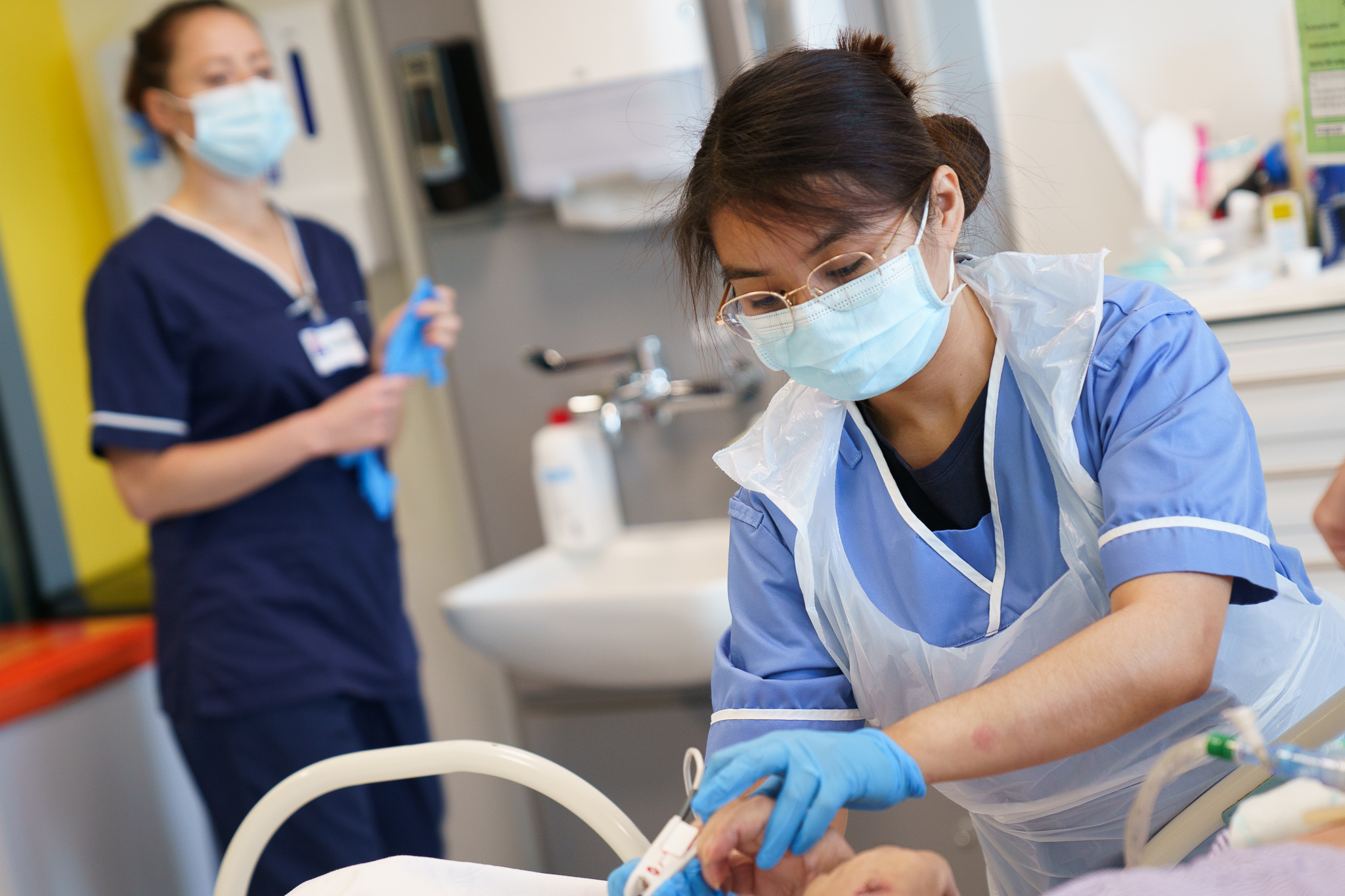 Nurses looking after a patient